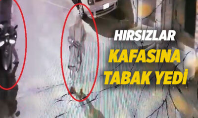 Balkondan hırsızın kafasına tabak yağdırdı